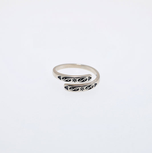 Sterling silver adjustable ring with a central Taiji-inspired form and Bagua trigram details